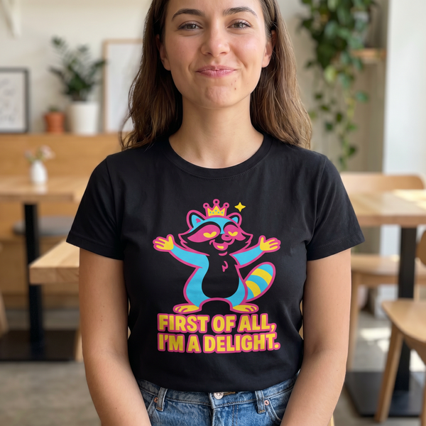 Woman at brunch wearing First of All I'm a Delight raccoon white tee, 1:1 lifestyle