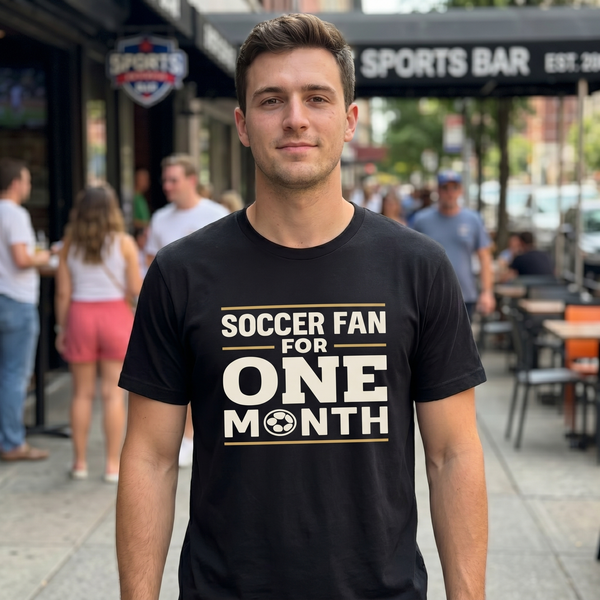Man wearing Soccer Fan For One Month black tee outside a sports bar
