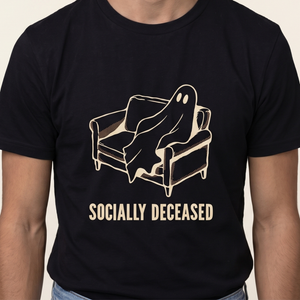 Socially Deceased tee worn front view, black unisex tee, bedsheet ghost slumped into a couch