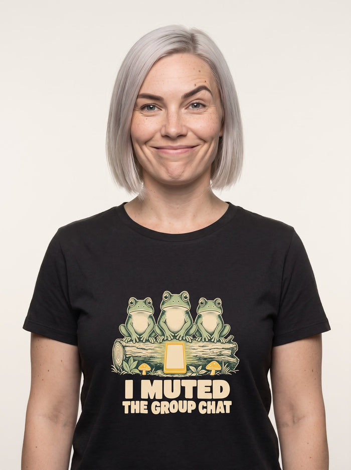 I Muted The Group Chat tee worn front view, black unisex tee, three frogs on a log with a phone