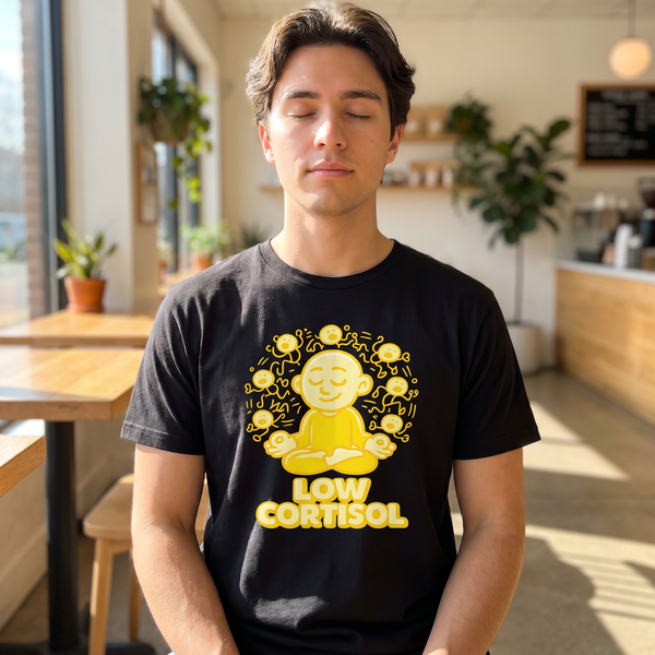 Person in coffee shop wearing Low Cortisol meditating Buddha tee, 1:1 lifestyle