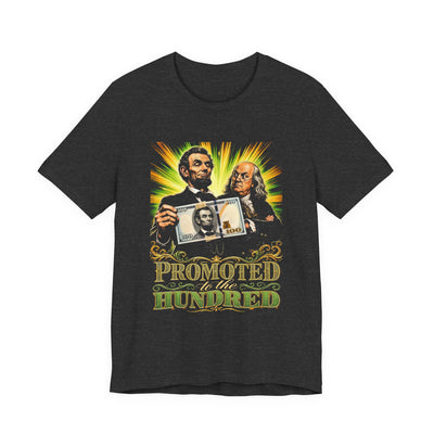 Dark grey heather tee printed with Lincoln and Franklin and a hundred-dollar bill on green and gold rays, text Promoted To The Hundred