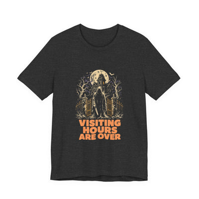 Dark grey heather tee printed with a haunted house and a hooded figure at the gate, text Visiting Hours Are Over