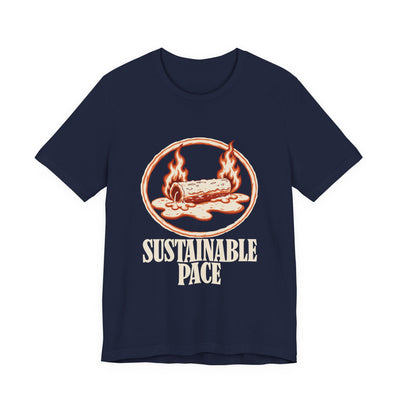 Sustainable Pace tee flat front, navy unisex tee, burning log melting into a puddle in an oval frame