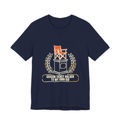 Season Ticket Holder To My Own Kid tee flat front, navy unisex tee, camp chair on a trophy plinth