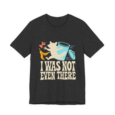 I Was Not Even There tee flat front, dark grey heather unisex tee, raccoon running from a tipped trash can