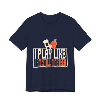 I Play Like I Am Still Nineteen tee flat front, navy unisex tee, a knee brace and ice pack above the type