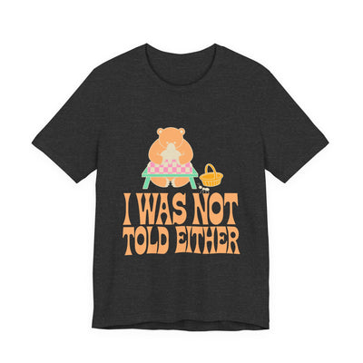 I Was Not Told Either tee flat front, dark grey heather unisex tee, bear at an empty picnic table