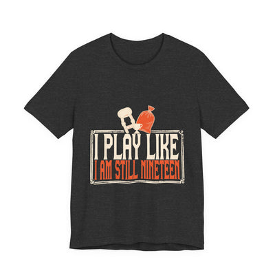 I Play Like I Am Still Nineteen tee flat front, dark grey heather unisex tee, knee brace and ice pack