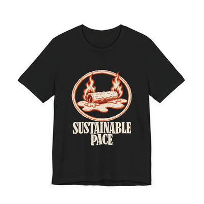 Sustainable Pace tee flat front, black unisex tee, burning log melting into a puddle in an oval frame