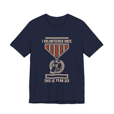 I Volunteered Once tee flat front, navy unisex tee, coach whistle as a campaign medal
