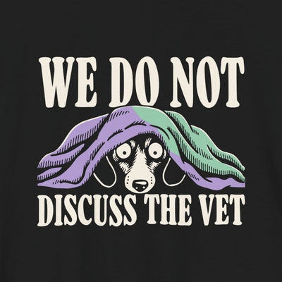We Do Not Discuss The Vet tee print close-up, black unisex tee, dog hiding under a blanket
