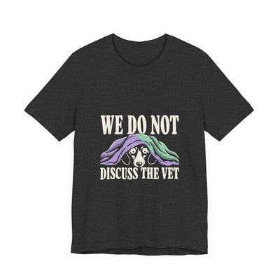 We Do Not Discuss The Vet tee flat front, dark grey heather unisex tee, dog hiding under a blanket