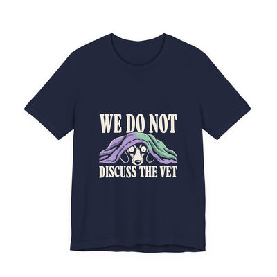 We Do Not Discuss The Vet tee flat front, navy unisex tee, dog hiding under a blanket