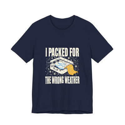 I Packed For The Wrong Weather tee flat front, navy unisex tee, suitcase of beach gear in snow