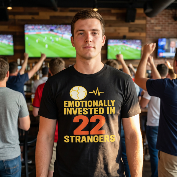 Soccer fan wearing Emotionally Invested In 22 Strangers shirt at a World Cup watch party
