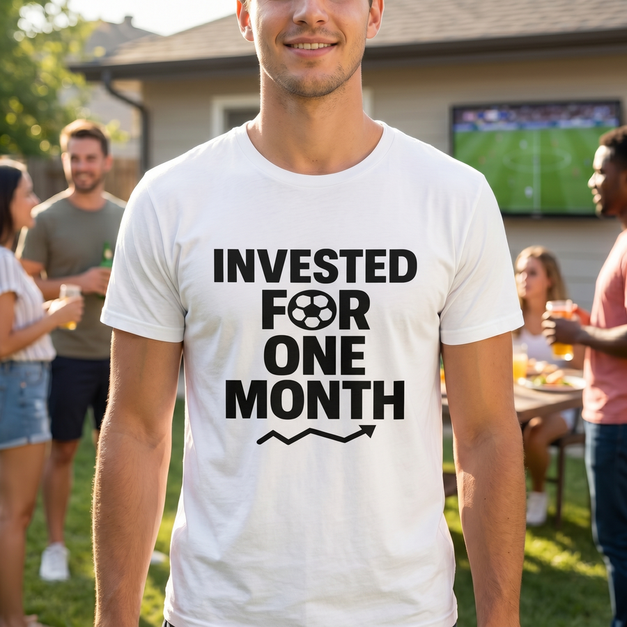 Man wearing Invested For One Month white soccer fan tee at a summer cookout