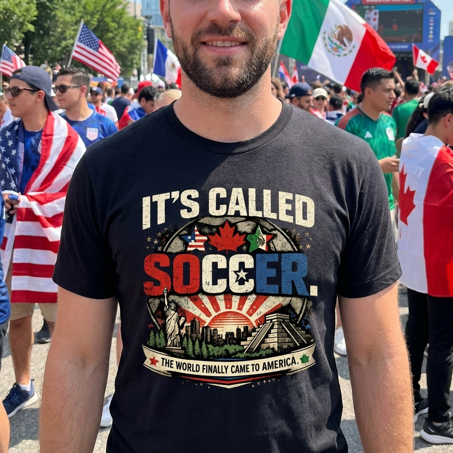 Fan wearing the It's Called Soccer World Cup 2026 host tee at an outdoor fan fest