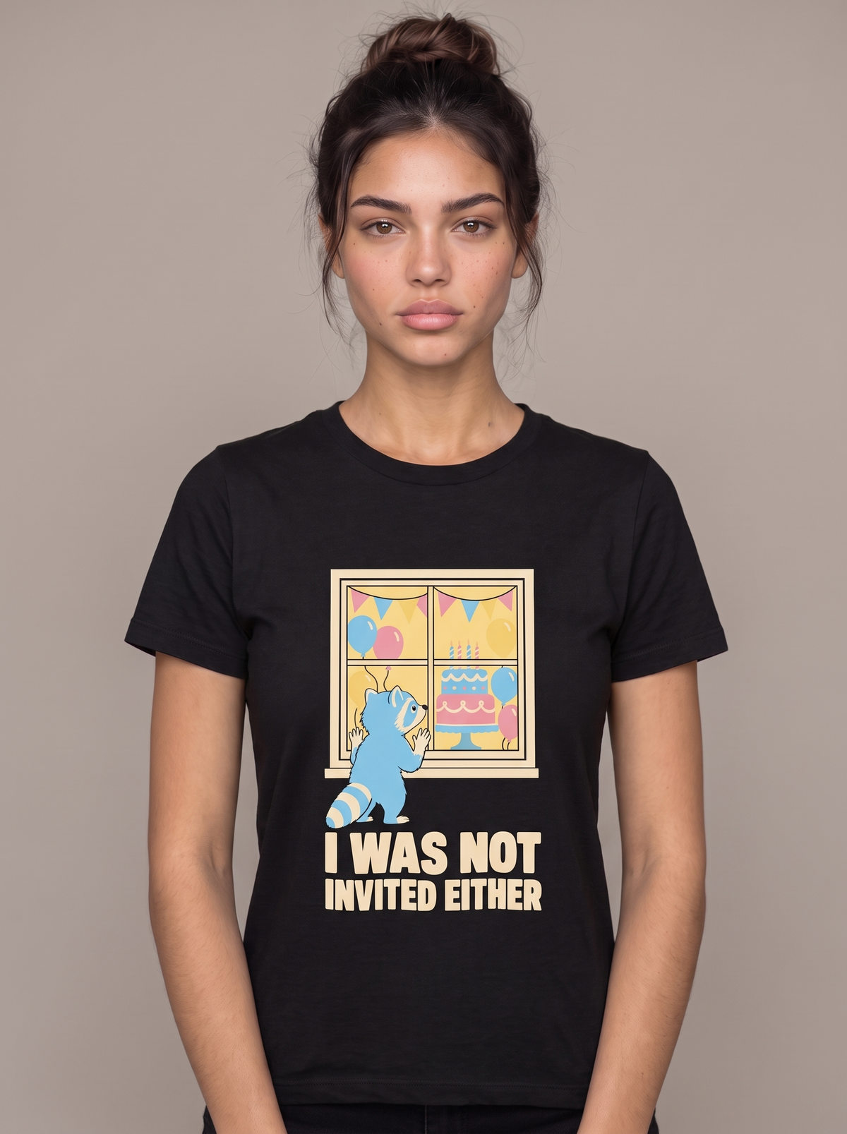 I Was Not Invited Either tee worn front view, black unisex tee, raccoon at a birthday party window