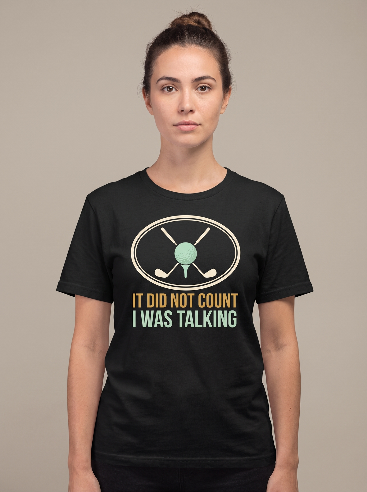 It Did Not Count I Was Talking tee worn front view, black unisex tee, two golf clubs crossed behind a ball on a tee