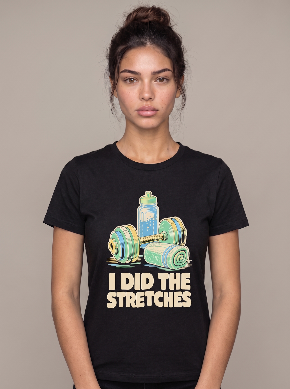 I Did The Stretches tee worn front view, black unisex tee, dumbbell, towel and water bottle