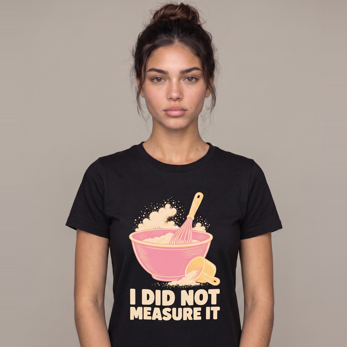 I Did Not Measure It tee worn front view, black unisex tee, mixing bowl and whisk