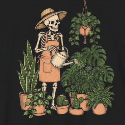 Skeleton Plant Parent tee print close-up, black unisex tee, skeleton in a sun hat watering a monstera and houseplants