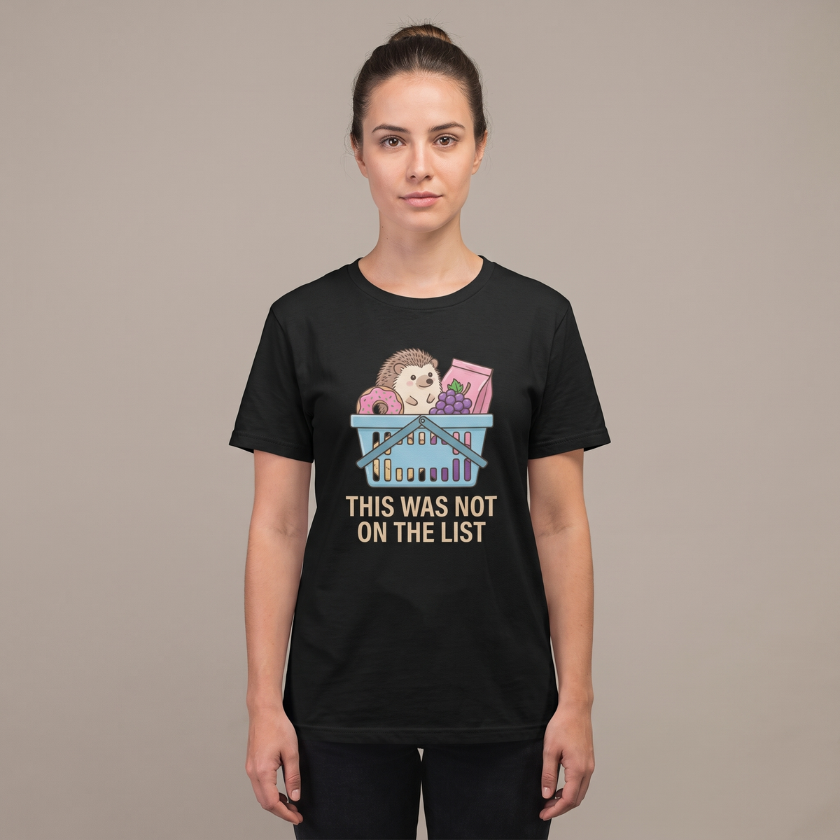 This Was Not On The List tee worn front view, black unisex tee, hedgehog in a basket of snacks