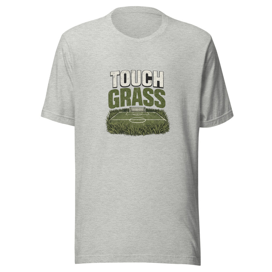 Touch Grass bold lettering above an illustrated soccer pitch, printed on a t-shirt