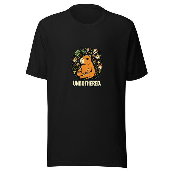 Zen capybara surrounded by chaos, UNBOTHERED text below, on black tee
